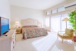 Relax in your spacious bedroom with private garden lanai